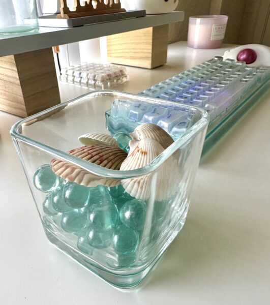 esthetic beach theme desk decor accessories glass vase blue marbles and shells